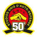 Studios Unis d'Auto-Défense Logo